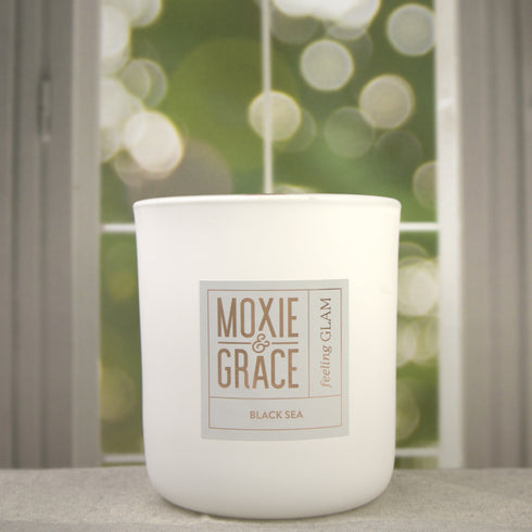 Sweet Tobacco 12oz Candle in White by Moxie & Grace — a rich, warm blend of tobacco, vanilla, honey, amber, and dark musk