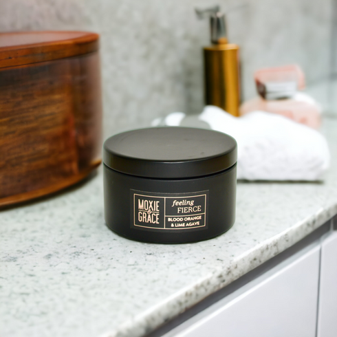 Blood Orange & Lime Agave Candle in Black Tin by Moxie & Grace — a bright citrus blend of blood orange, lime, agave, and warm musk