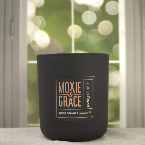 Blood Orange & Lime Agave 12oz Candle in Black by Moxie & Grace — a bright citrus blend of blood orange, lime, agave, and warm musk