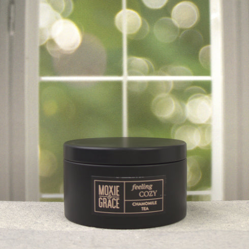 Chamomile Tea 5oz Candle in Black by Moxie & Grace — a calming blend of chamomile, honey, vanilla, and soft musk