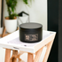 Coconut Milk & Honey 5oz Candle in Black by Moxie & Grace — a soft, creamy blend of coconut milk, honey, vanilla, and warm musk