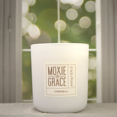 Citronella 12oz Candle in White by Moxie & Grace — a fresh outdoor blend of citronella, lemongrass, eucalyptus, and cedar