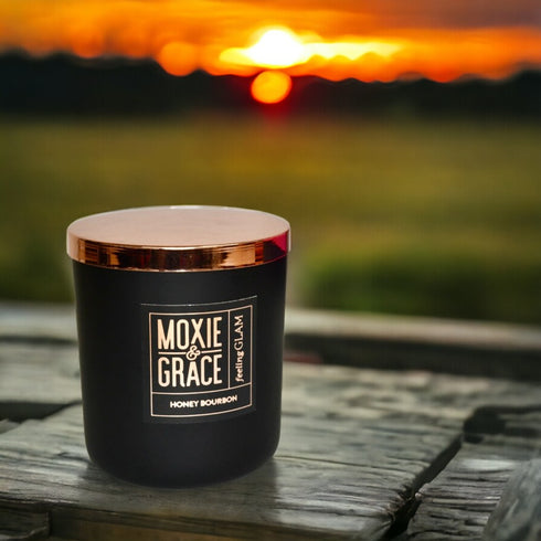 Honey Bourbon 12oz Candle in Black by Moxie & Grace — a rich, warming blend of honey, bourbon, vanilla, amber, and oak