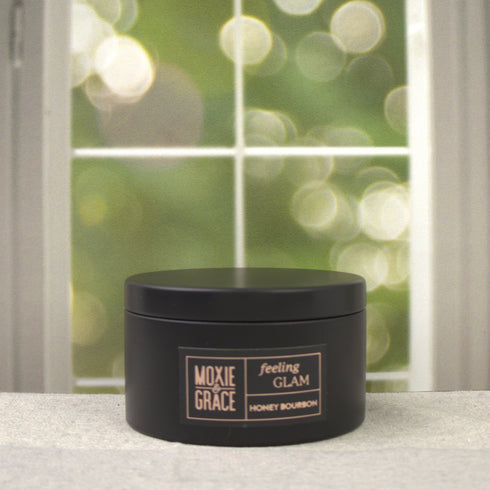 Honey Bourbon 5oz Candle in Black by Moxie & Grace — a rich, warming blend of honey, bourbon, vanilla, amber, and oak