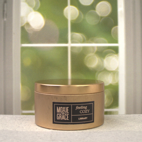 Library 5oz Candle in Copper by Moxie & Grace — a sophisticated blend of teakwood, cedar, leather, sandalwood, and dark musk