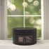 Love Tonic 5oz Candle in Black by Moxie & Grace — a sweet fruity-floral blend of apple, peach, cherry blossom, hydrangea, and vanilla