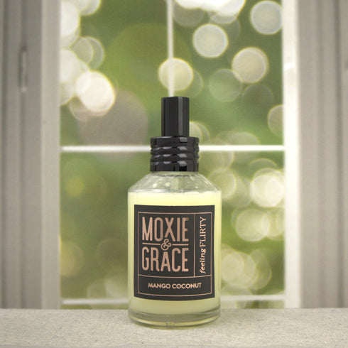 Mango Coconut Room Spray 4oz bottle by Moxie & Grace — tropical mango, pineapple, peach, and creamy coconut fragrance, non-toxic and USA-made