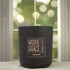 Mistletoe 12oz Candle in Black by Moxie & Grace — a festive blend of pine, peppermint, eucalyptus, and fresh winter greens