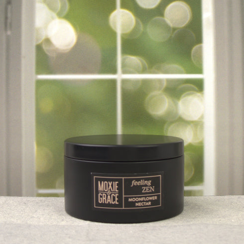 Moonflower Nectar 5oz Candle in Black by Moxie & Grace — an enchanting blend of pear, agave, marine florals, dark musk, and amber