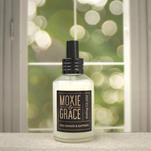 Red Ginger & Saffron 4oz Room Spray by Moxie & Grace — a vibrant blend of ginger, saffron, lemon, amber, patchouli, and cedarwood