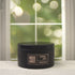 Solar Sands 5oz Candle in Black by Moxie & Grace — a warm, sun-drenched blend of sand, amber, musk, and golden citrus notes