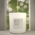 Solar Sands 12oz Candle in White by Moxie & Grace — a warm, sun-drenched blend of sand, amber, musk, and golden citrus notes