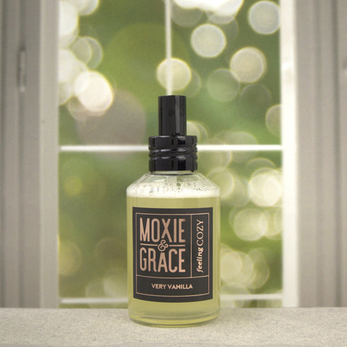 Very Vanilla Room Spray 4oz bottle by Moxie & Grace — warm vanilla bean and buttercream gourmand fragrance, non-toxic and USA-made