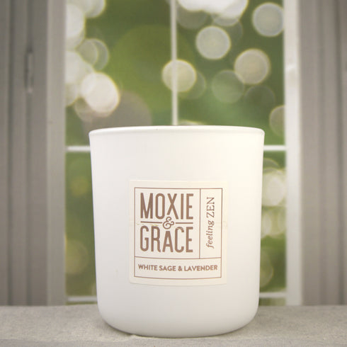 White Sage & Lavender 12oz Candle in White by Moxie & Grace — a calming, herbal blend of white sage, lavender, eucalyptus, and soft musk